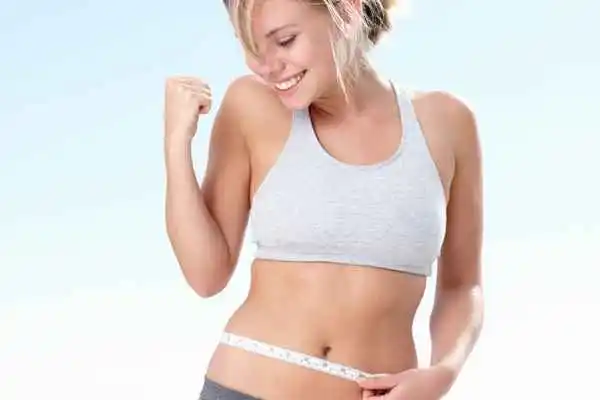 woman happy after fat reduction treatment Liphook
