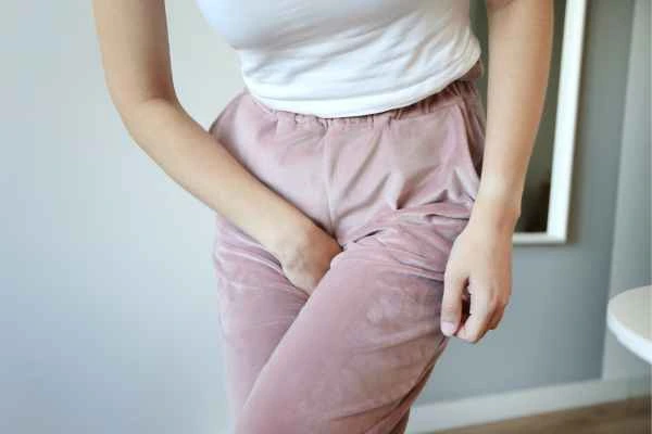 older woman running to the toilet because of urinary incontinence Liphook